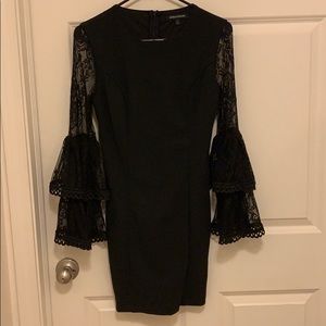 Mini black bodycon dress with flounce sleeves